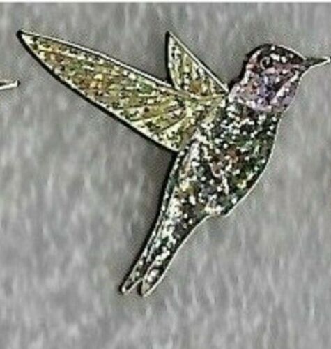 Board 01 12. Hummingbird pin badge. Green version. Two other colours are available. wombats pin badges